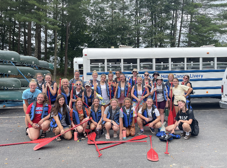 field trip with bus, field hockey players